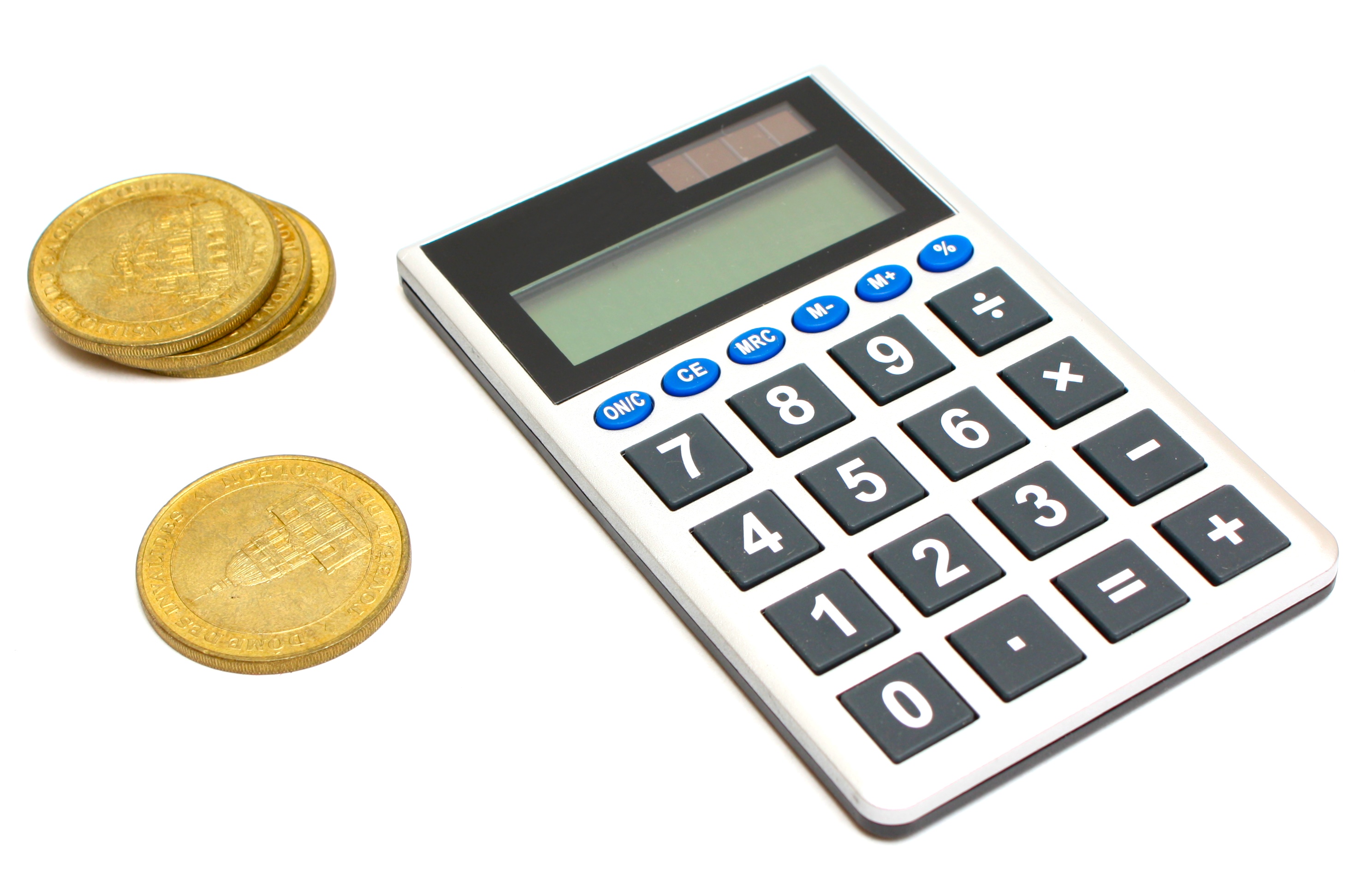 Calculator and gold coins - gold price calculation